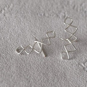 Boucles d'oreilles "Crowned V »