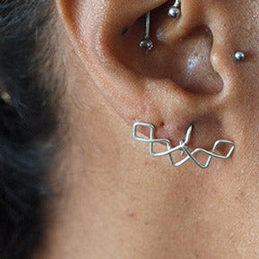 Boucles d'oreilles "Crowned V »