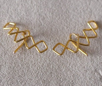 Boucles d'oreilles "Crowned V »
